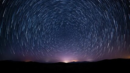 Wall Mural - Circular star trails arc across a deep night sky above a dark horizon, forming abstract celestial energy patterns in a timelapse timelapse, natural phenomenon, motion