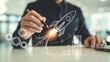© Pixel Zone - Businessman drawing a rocket ship with glowing engine and gears representing startup business growth and innovation