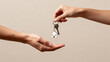 © Erika - Hands exchanging house keys