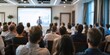 © VistaVisions - Audience Watching a Presentation. Defocused Blurred Presenter During Conference Meeting