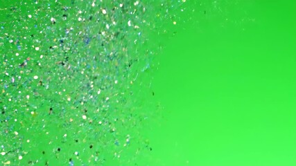 Wall Mural - Extreme close-up shot of shimmering multicolored glitter particles slowly shifting against a soft green screen backdrop, a perfect compositing asset soft, particles, asset