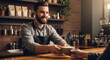 © Meow Creations - Friendly male barista with a beard serving a steaming cup of coffee to a customer in a modern cafe