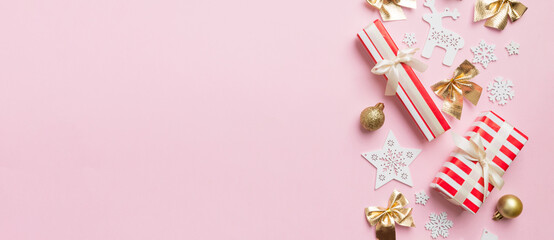 Wall Mural - New Year composition. Christmas decor background with gift boxes. Top view with copy space