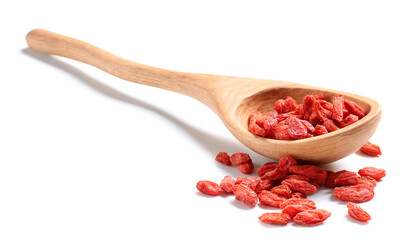 Wall Mural - Wooden spoon with red dried goji berries on white background