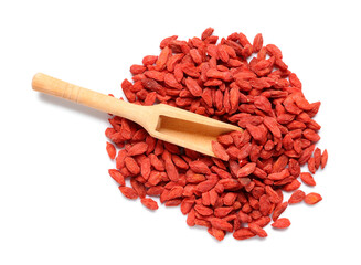 Wall Mural - Wooden scoop with red dried goji berries on white background