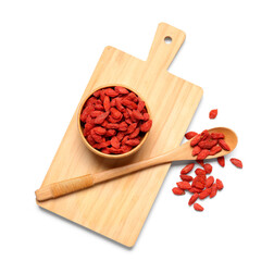 Wall Mural - Wooden bowl and spoon with red dried goji berries on white background