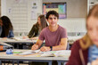 © Rido - Confident teen learning at high school during lesson
