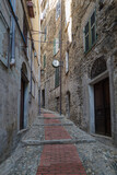 Narrow street in the ancient village of Ceriana, Imperia, Italy