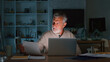 © Monkey Business - Senior Man At Home Working On Laptop And Checking Household Finances At Night