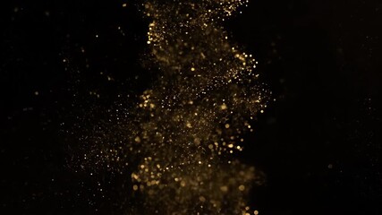 Wall Mural - shimmering gold particles slowly spiral and dissipate like a cosmic dust cloud in macro view elegant