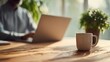 © Maciej Koba - Home office workspace with laptop and coffee cup remote work lifestyle concept