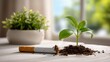 © Maryia - Broken cigarette beside green sprout growing from soil on white table, soft morning light and minimal airy aesthetic symbolizing quit smoking, healthy lifestyle, recovery, and fresh new beginnings.
