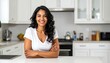 © NURFADLUN - Woman smiling in a kitchen