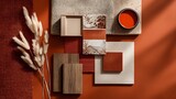 Interior design material samples in warm earthy tones.