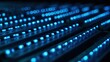 © Anda - rack. Close-up of glowing blue server rack lights creating an abstract technological pattern on a dark background. product launch decks.