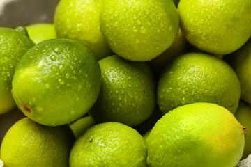 Wall Mural - Texture of fresh ripe limes, closeup