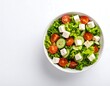 © welli - Fresh Garden Salad with Cubed Cheese and Cherry Tomatoes on a White Background
