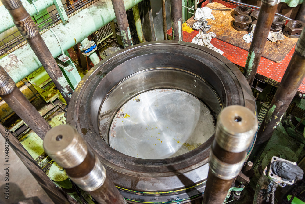 Engine Cylinder In Ship View of the top of a large double stroke engine cylinder liner on a ...