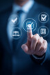 © Starmarpro - Digital confirmation: Man selecting checklist icon for task approval, showcasing online verification and business process completion.