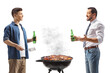 © Ljupco Smokovski - Men drinking beer and making bbq