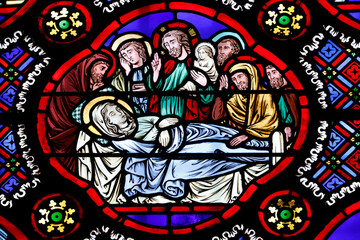  Saint Pierre church.  Stained glass. The Dormition of the Virgin Mary, celebrated on August 15. Saumur. France.
