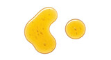 Two golden liquid gel blobs with tiny air bubbles glistening on a clear surface