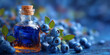 © Bezvershenko - Blueberries with herbal tincture bottle on blurred blue background, natural fruit and healing remedy concept - AI generated