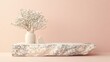 © Zero212 - Minimalist floral arrangement on stone shelf against pale pink wall; product display