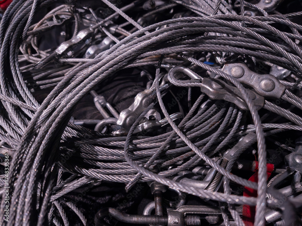 Steel wire ropes and associated hardware creating a dense industrial ...