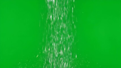 Wall Mural - Gentle timelapse of a continuous shower of silver glitter slowly falling against a green screen clean, sparkle, technology