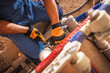 © Tomasz Zajda - Professional Plumber Repairing Pipes With Tools in a Construction Area