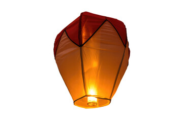 Wall Mural - Illuminated sky lantern, glowing warmly against a dark background. background removed