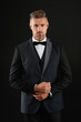 © be free - Successful man in formal menswear. Menswear fashion. Elegant tuxedo bowtie. Rich businessman on formal event. Man in rich bespoke tux. Tuxedo man in menswear isolated on black. Tailored tux
