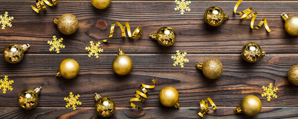 Wall Mural - Christmas composition. a pattern of christmas balls on colored background. Flat lay, top view New year decor