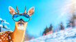© Ruslan - A reindeer wearing snowboarding goggles and a hat stands at the top of a ski slope against a backdrop of snow-capped mountains and a blue sky