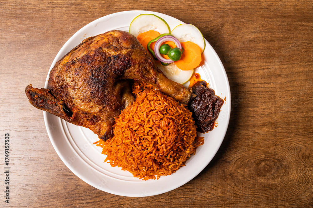 Ghanaian Jollof Rice with Grilled Chicken, Long-grain rice cooked in a ...