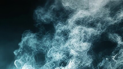 Wall Mural - Abstract smoke pattern forming ethereal blue vapor background
