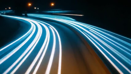 Wall Mural - Light trails creating motion blur on night highway