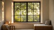 © supaporn - Accessory Dwelling Unit Cozy interior with a large window showcasing greenery and natural light.
