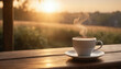 © picpics - Tasse de café fumante sur une table en bois au lever du soleil. Réveil zen calme apaisé tranquille petit-déjeuner. Commencer la journée du bon pied.