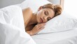 © Stefan Schurr - woman sleeping on bed with blanket and pillow