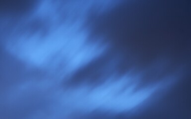 Wall Mural - blurry dark rain cloud floating on sky at sunset in evening