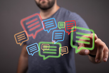 A person interacts with holographic message icons, symbolizing connectivity and the ease of online communication in the digital world.