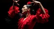 © Nikole24 - Passionate flamenco dancer in vibrant red dress performing with grace and elegance. Flamenco dancer showcases traditional movement with expressive hands and emotive expressions.