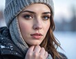© Dtx - Beautiful young woman in a winter hat, snowy outdoors