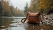 © mf2 - Leather cross body bag on river bank in autumn, outdoor fashion