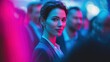 © keks20034 - Confident woman in glasses standing still among blurred crowd in neon light