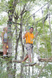 © auremar - family on a rope climbing in the adventure park