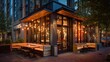 © mila103 - This scene showcases a contemporary restaurant with an inviting outdoor seating area illuminated by warm lights. The urban location adds to the lively atmosphere during the evening hours.