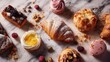 © elenaed - Flat lay of assorted French pastries on a marble counter warm morning light rustic wooden background crumbs scattered